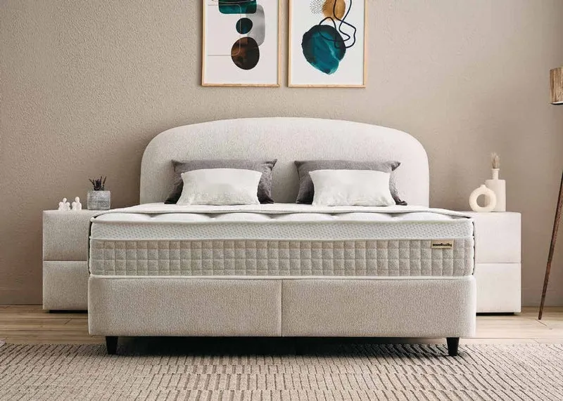 Casa Padrino Luxus Boxspringbett mit geschwungenem Kopfteil Creme 160 x 200 cm - Luxus Schlafzimmer Möbel