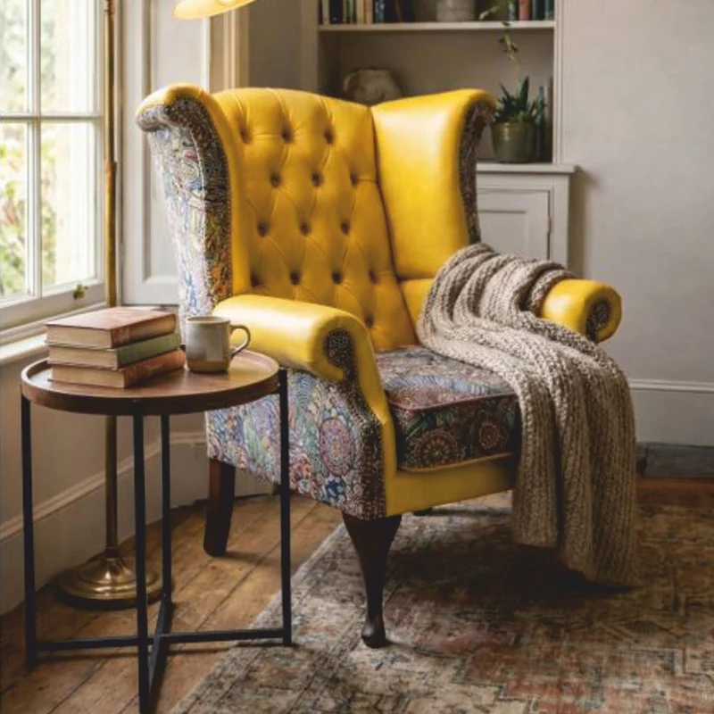Casa Padrino Luxus Chesterfield Leder Ohrensessel Gelb / Bunt / Dunkelbraun H. 110 cm