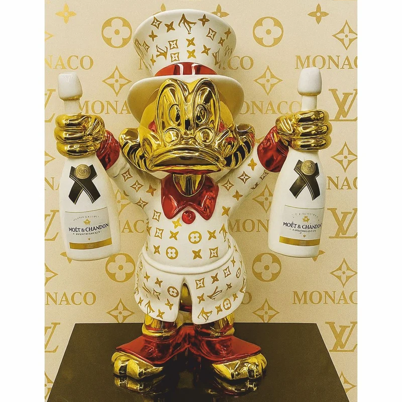 Casa Padrino Deko Figur Ente Gold / Weiß / Rot H. 45 cm - Deko Skulptur