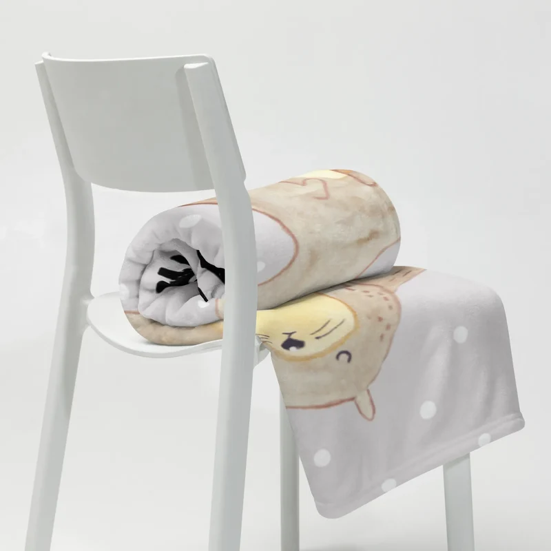 Babydecke Otter Hände halten