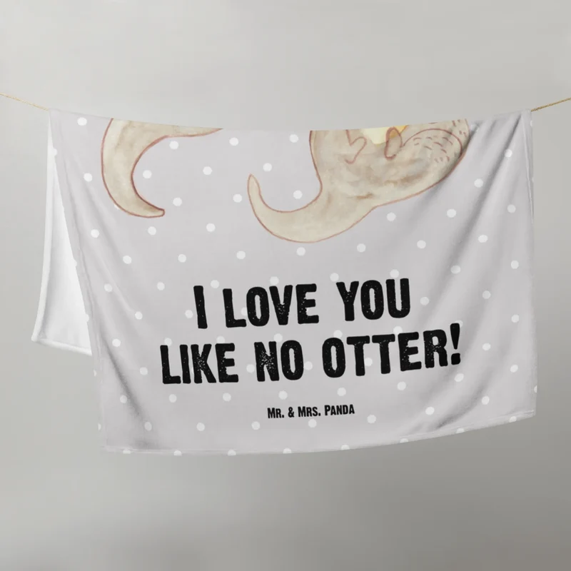 Babydecke Otter Hände halten