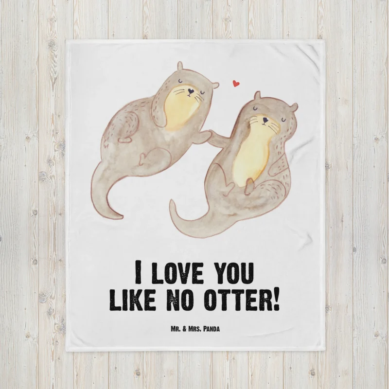 Babydecke Otter Hände halten