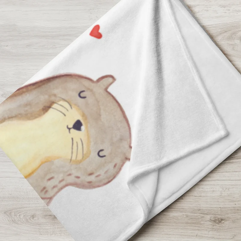 Babydecke Otter Hände halten